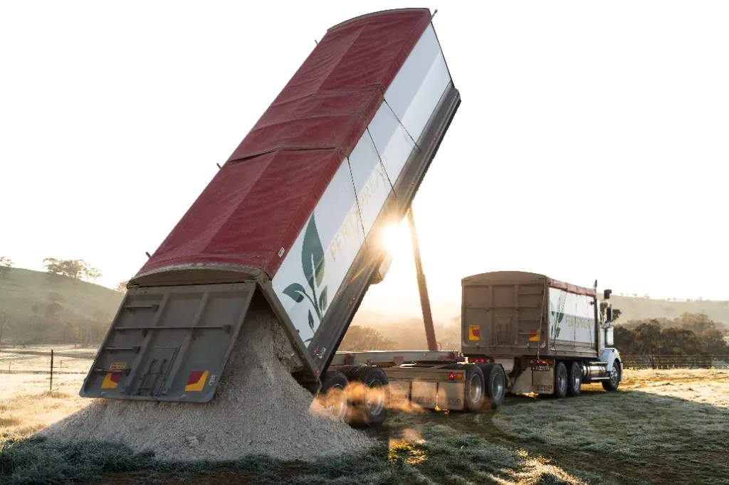 Fertspread tipper truck delivering bulk fertiliser